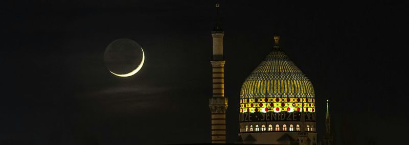 Low angle view of illuminated built structure