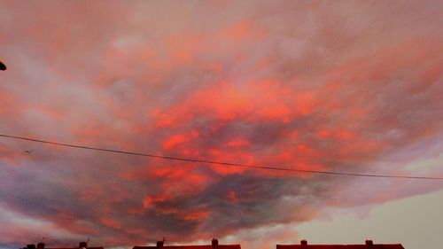 Low angle view of dramatic sky during sunset