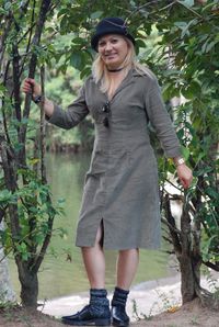 Portrait of young woman standing outdoors