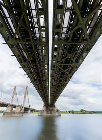 Low angle view of bridge over river