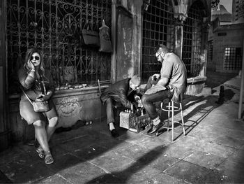 Young couple sitting on chair