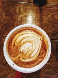 Close-up of cappuccino on table