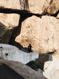 Man standing on rock formation