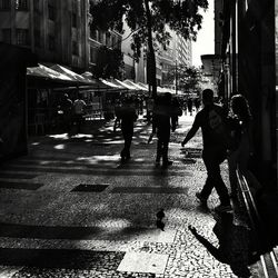 People walking on city street