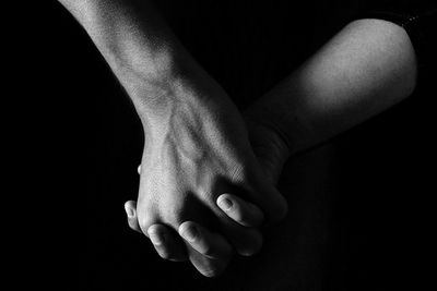 Close-up of woman holding hands