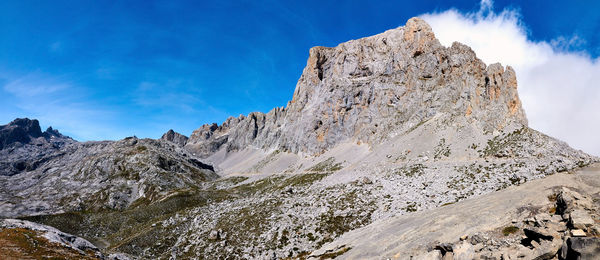 Low angle view of rock formations against sky