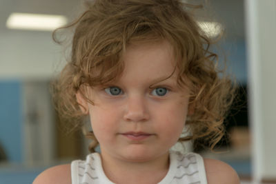 Close-up of cute girl at home