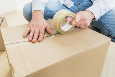 Midsection of man working at home