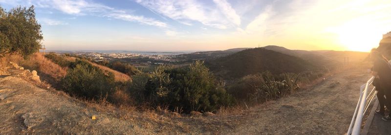 Panoramic view of landscape against sky during sunset