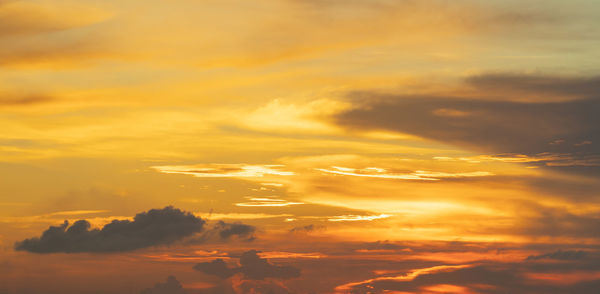 Scenic view of dramatic sky during sunset