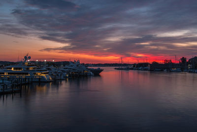 View of harbor at sunset