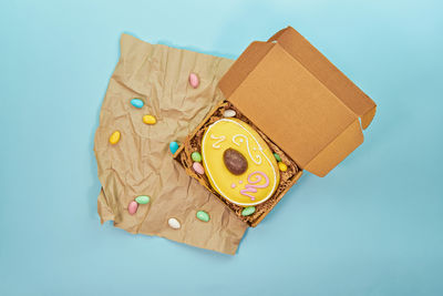Close-up of gift box on blue background