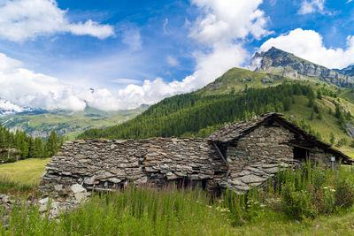 Old abandoned stone house in the village of cheneil valtournenche aosta italy