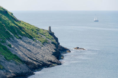 Scenic view of sea coast against sky