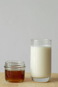 Close-up of drink in glass jar on table