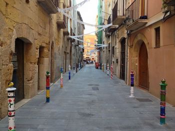 Narrow alley along buildings