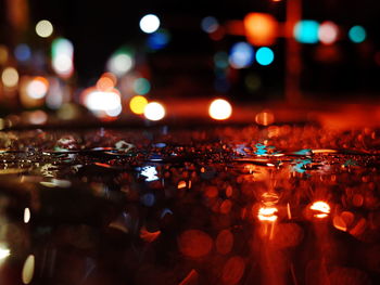 Close-up of illuminated water at night