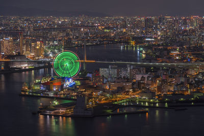 Illuminated buildings in city at night