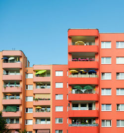 Low angle view of building against clear blue sky