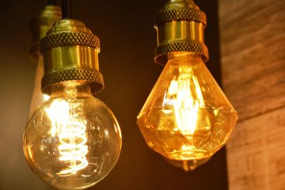 Close-up of illuminated light bulb