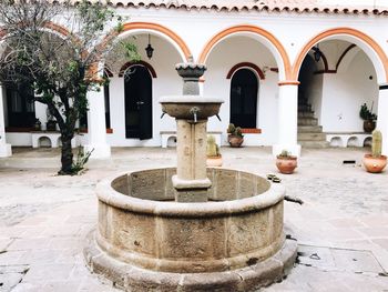 Fountain in front of building