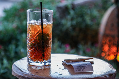 Close-up of a red drink in glass on table