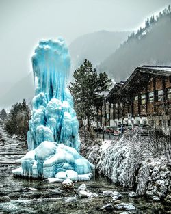 Scenic view of snow covered mountains