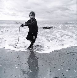 Woman standing on beach