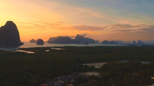 Scenic view of sea against sky during sunset