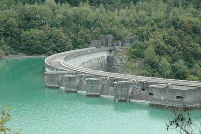 High angle view of dam by lake