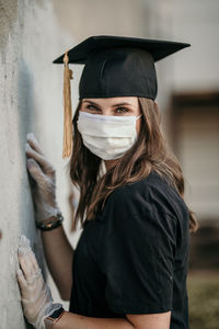 Portrait of woman standing outdoors