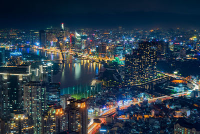 High angle view of illuminated city at night