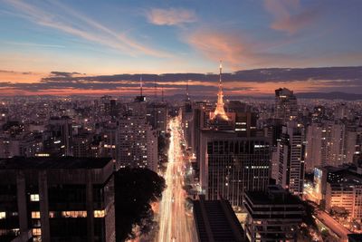 High angle view of city buildings during sunset