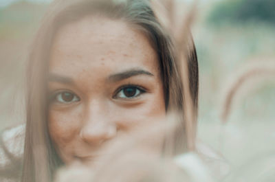 Close-up of beautiful woman outdoors