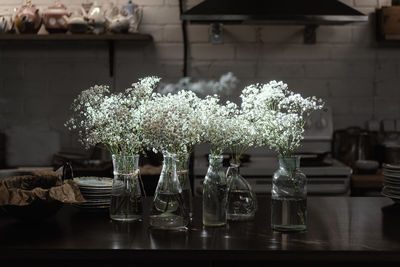 Close-up of flower vase on table