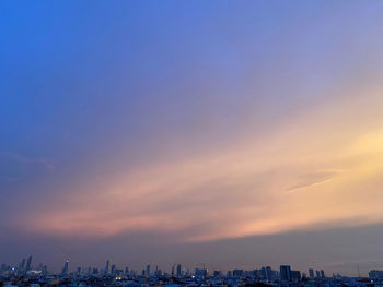 High angle view of cityscape against sky during sunset