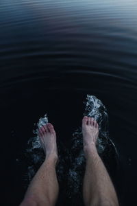 Low section of man in water