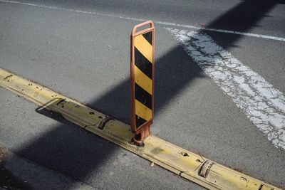 Close-up of white line on road