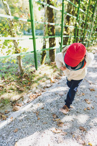 A boy running in a park