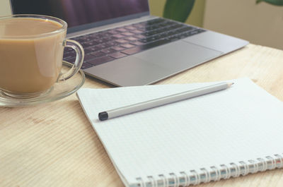 Coffee cup on table