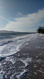 Scenic view of sea against sky during winter