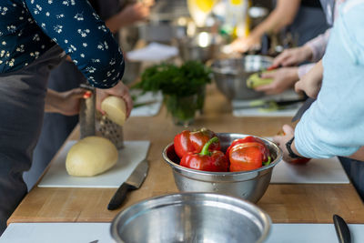 Midsection of woman preparing food