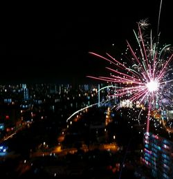 Firework display at night