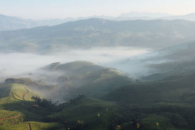 High angle view of mountains in foggy weather