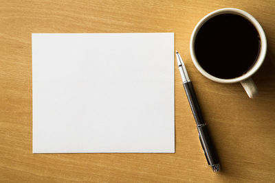 High angle view of coffee cup on table