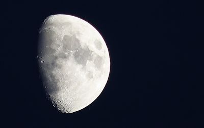 Low angle view of moon in sky