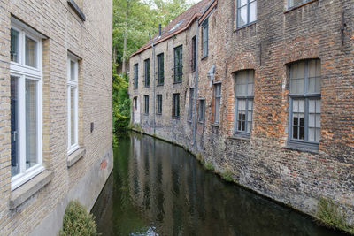 View of canal between buildings