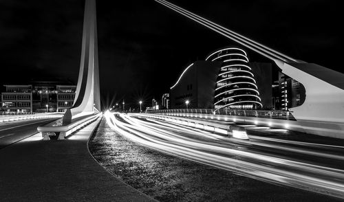 Light trails on samuel beckett bridge at night