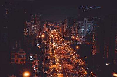 High angle view of illuminated buildings at night