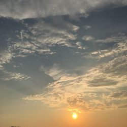 Low angle view of dramatic sky during sunset